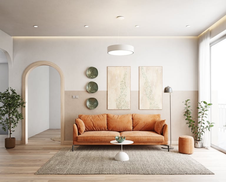 A cozy living room with an orange sofa, plants, and elegant decor